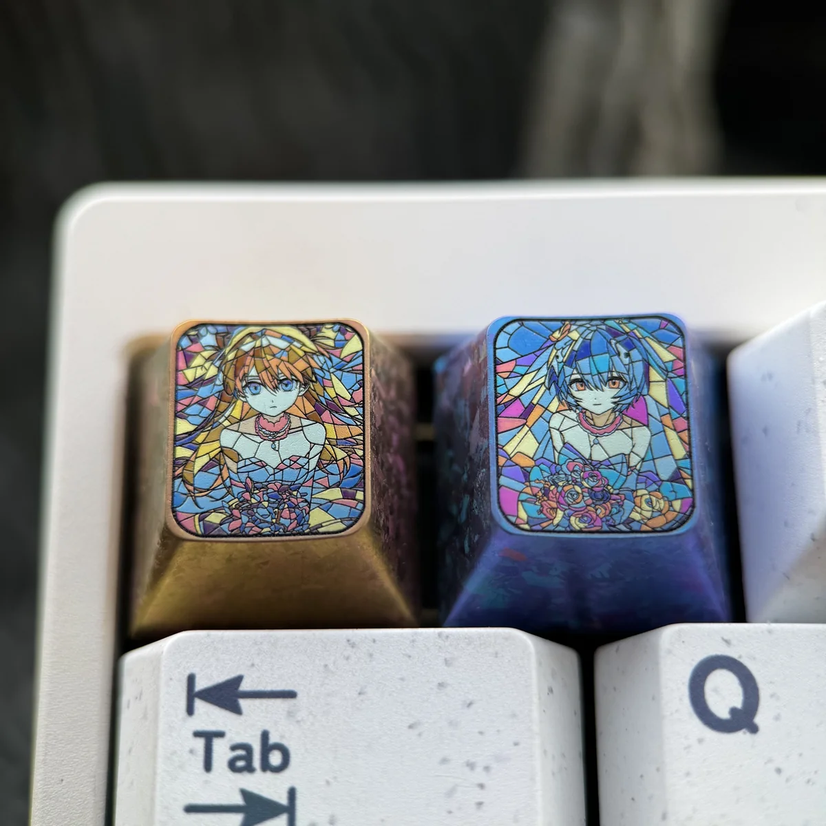 Premium Titanium Evangelion Keycap: Artistic artisan featuring Asuka & Rei amidst a dynamic broken glass design, a lustrous collector's piece.