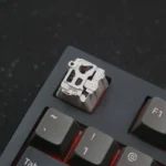 Premium zinc-aluminum alloy sci-fi keycap, MOSS Wandering Earth artisan design, showcasing its intricate futuristic craftsmanship and distressed your workspace.