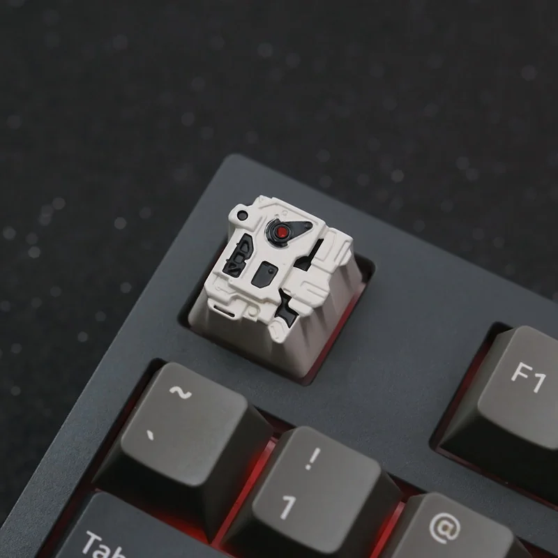 Premium zinc-aluminum alloy sci-fi keycap, MOSS Wandering Earth artisan design, showcasing its intricate futuristic craftsmanship and distressed your workspace.