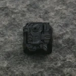 Premium zinc-aluminum alloy sci-fi keycap, showcasing its distressed artisan design and futuristic space aesthetic.