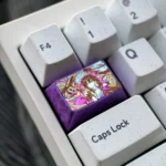 Close-up of the exclusive Kurumi Tokisaki titanium artisan keycap, showcasing intricate anime art and gothic elegance on sleek, durable titanium alloy.