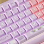 Artistic views of the exquisite Lily Valley MDA PBT keycaps set, featuring delicate white lily of the valley flowers on a tranquil background.