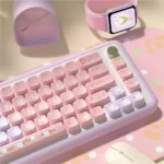 Exquisite Lily Valley MDA PBT keycaps set with delicate white lily of the valley flowers, artfully shown from various angles on a tranquil background.