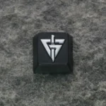 Delta Force: GTI Logo Keycap showcasing its sleek metallic finish and iconic logo, perfect for enthusiasts.