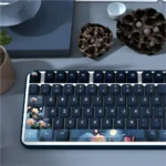 Artistic PBT dye-sub Moonlit Lotus Pond Keycaps Set, showing delicate lotus flowers and tranquil water from a new angle, reflecting serene Chinese aesthetics.