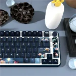 Artistic PBT Dye-Sub Moonlit Lotus Pond Keycaps Set from a unique angle, showcasing tranquil water, delicate flowers, and calming traditional Chinese aesthetics.