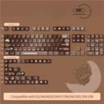 Side view of adorable Lucky Bear PBT gradient keycaps set, highlighting the smooth brown color transition and charming whimsical bear design. Brings cozy design.