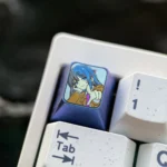 An alternative angle of the premium Mai Sakurajima titanium ESC keycap, revealing the intricate sculpted anime art and its luxurious metallic sheen.