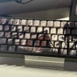 A gallery of Man Jiang Hong PBT Dye-Sub Keycaps Set from multiple angles, showcasing their exquisite deep red hues, traditional Chinese calligraphy.