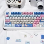 Vibrant close-up of adorable manga kitten PBT keycaps set, showcasing the charming details and durable PBT material from a unique angle.