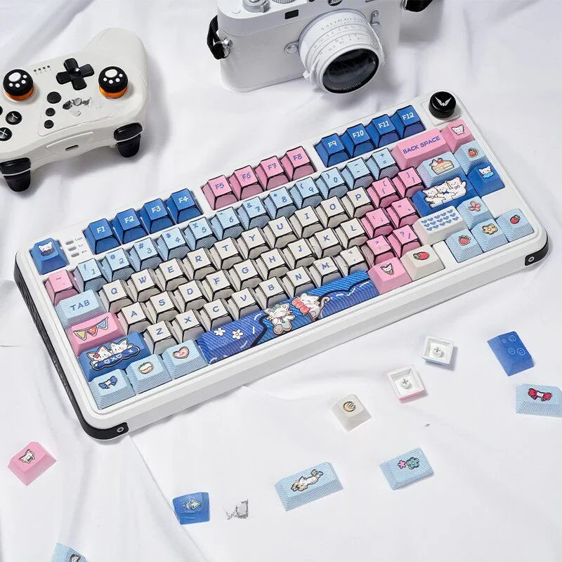 Adorable manga kitten PBT keycaps set, featuring charming, vibrant designs for a cute, lively keyboard aesthetic and durable typing experience.