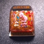 An exquisite artisan Mew keycap, captured in a detailed close-up, revealing its ethereal pastel hues and mystical Pokemon charm.