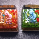 An exquisite artisan Mew keycap featuring ethereal pastel hues, capturing the legendary Pokemon's mystical charm.