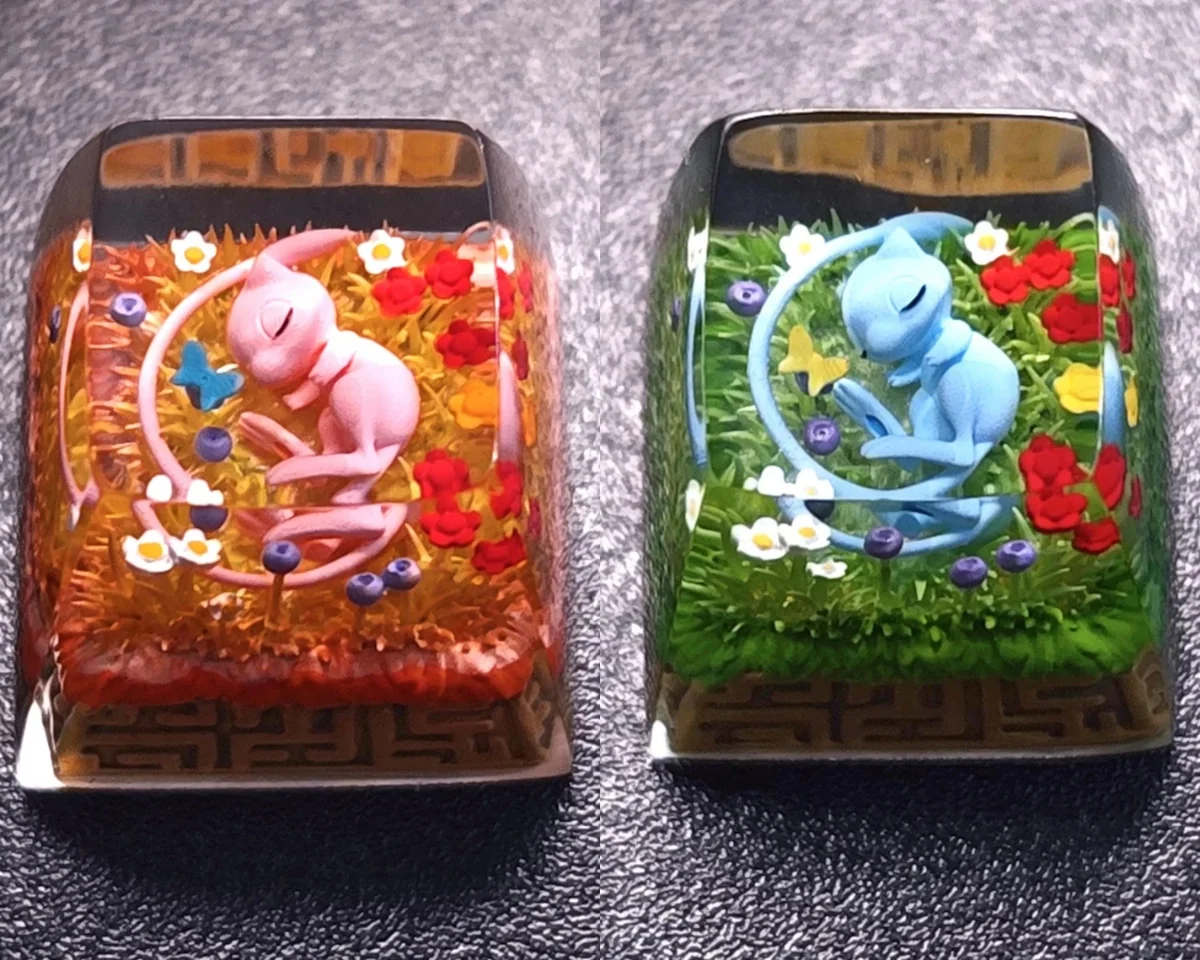 An exquisite artisan Mew keycap featuring ethereal pastel hues, capturing the legendary Pokemon's mystical charm.