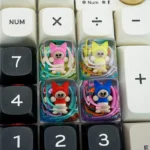 A charming, handcrafted Monster Hunter Palico keycap featuring a vibrantly sculpted Palico character, perfect for gaming enthusiasts.