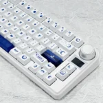 Sea Moon PBT keycaps set, displaying artistic glowing moon designs. Crisp dye-sub legends on durable PBT material, capturing serene design.