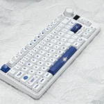 Sea Moon PBT Dye-Sub Keycaps set displaying glowing moon amidst serene aquatic hues. Durable PBT ensures crisp, long-lasting legends.