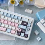 Detailed views of Elegant Moonlit Rose PBT keycaps set, showcasing delicate rose motifs and romantic dark aesthetic under a gentle moonlit glow.