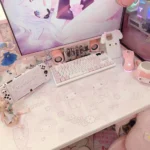 Whimsical My Melody & Piano extra-large desk mat, showing the adorable pastel pink lamb and piano motif from a fresh perspective on the charming surface.