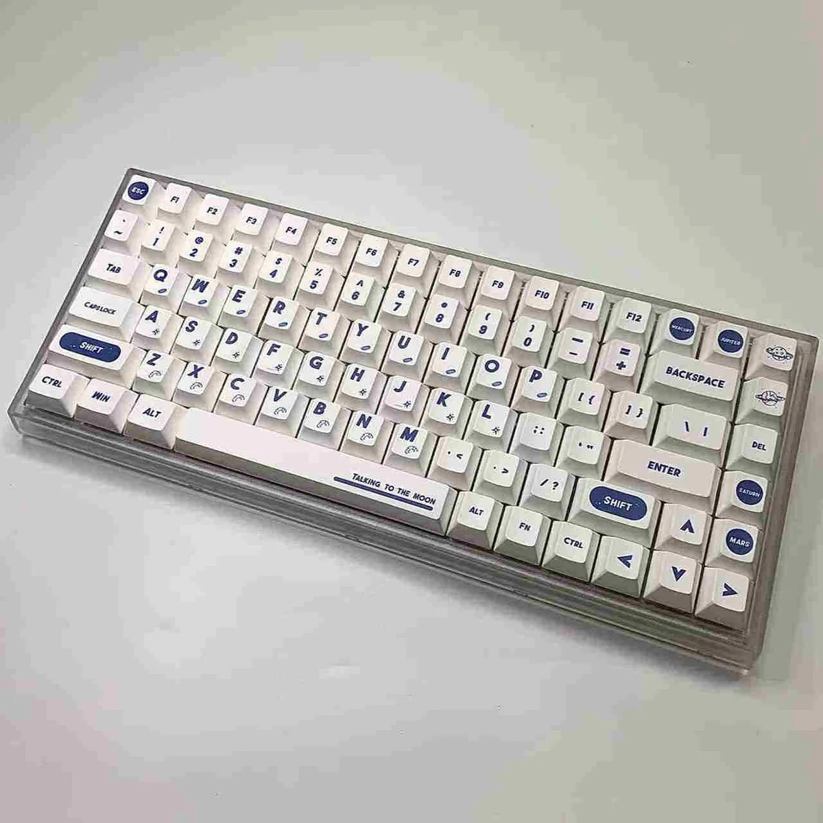 NASA PBT Dye-Sub Keycaps Set for a cosmic journey. Durable, premium keycaps feature iconic space exploration and astronaut designs.