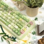 Artisan Nature PBT Keycaps: Serene Mountain Stream MCA Keycap Set. Dye-sublimated mountain stream foliage in earthy tones, shown from multiple angles.
