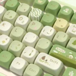 Detailed view of Artisan Nature PBT Keycaps Set, highlighting the exquisite serene mountain stream motif and earthy tones on dye-sublimated MCA set.