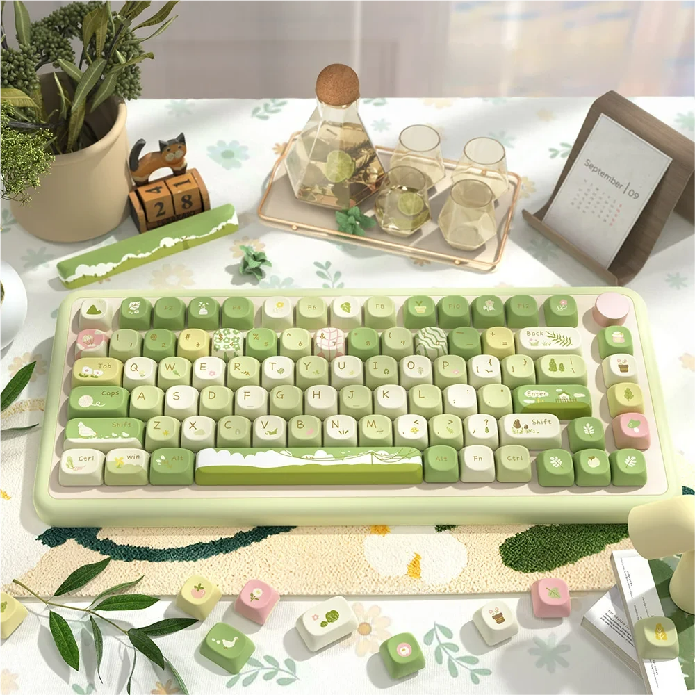 Artisan Nature PBT Keycaps: Serene Mountain Stream MCA Keycap Set. Dye-sublimated keycaps showcasing tranquil mountain and stream landscapes in earthy tones.