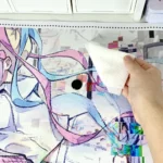 A detailed view of the exclusive KAngel Needy Streamer Overload desk mat, showcasing its vibrant anime character art and internet culture aesthetic.