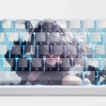 A close-up view of the NieR Automata 2B side-lit PBT keycaps set, revealing their dystopian elegance and the iconic character design's intricate details.