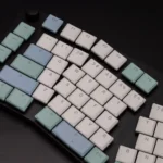 Nordic Low Shaft Supplement Keycap Set for Kailh Choc V1 switches, shown from various angles, highlighting their clean, minimalist design.