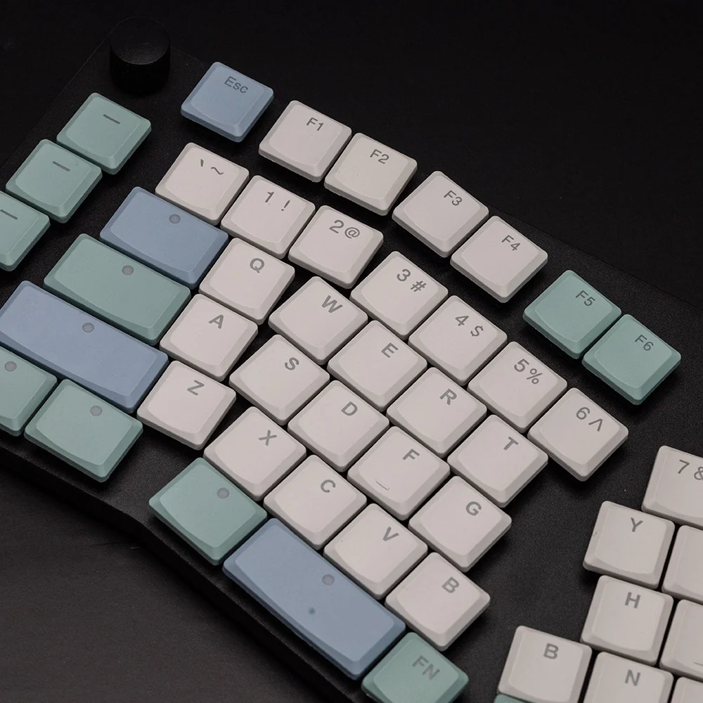 Nordic Low Shaft Supplement Keycap Set for Kailh Choc V1 switches, shown from various angles, highlighting their clean, minimalist design.