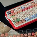 Explore various angles of the complete PBT One Piece Straw Hat keycap set, featuring vibrant, detailed anime characters and symbols for your next adventure.