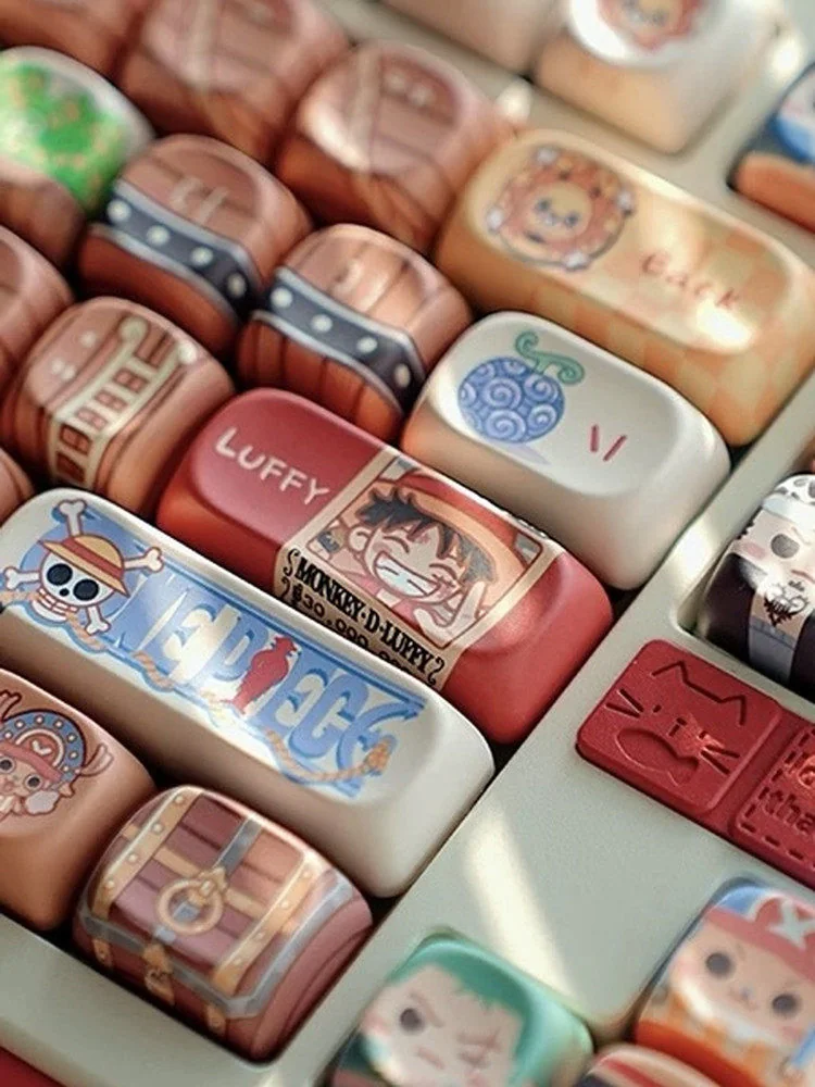 Explore the complete One Piece Straw Hat PBT keycap set from various angles, revealing vibrant, rich anime details and iconic crew symbols.