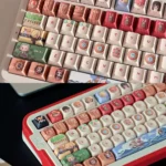 Vibrant One Piece Straw Hat PBT keycap set. Complete PBT One Piece keycaps featuring iconic Straw Hat Crew characters and symbols for an adventurous motifs.