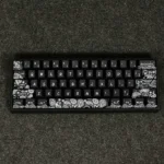 Close-up of the Artistic Paisley PBT Dye-Sub Keycap Set, showcasing intricate bohemian patterns and rich textures for a vintage desk aesthetic.