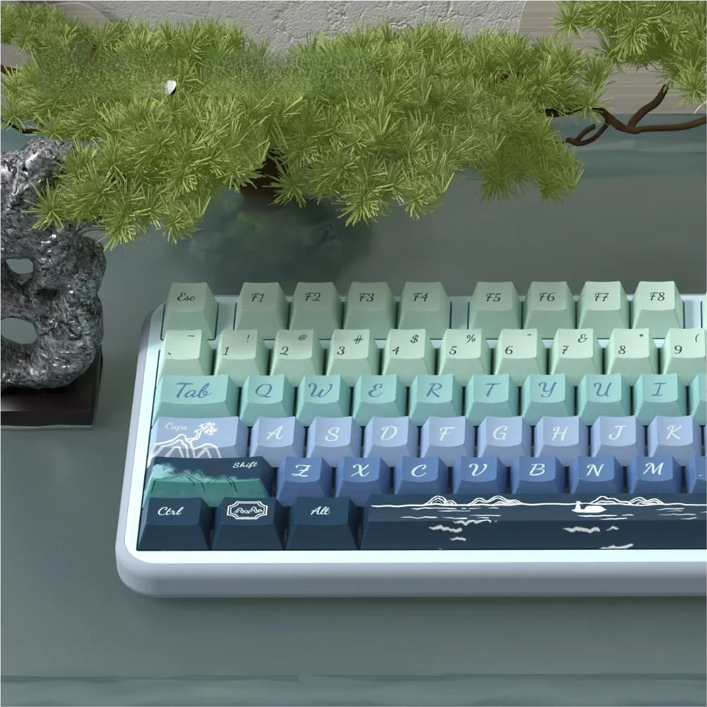 Serene Wind artistic PBT keycap set, multi-angle. Features tranquil landscapes, wind, and cloud motifs in soothing colors for serene typing.