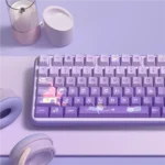 Close-up of Meow Castle Cat PBT Keycaps Set in Taro Purple, highlighting the adorable dye-sublimated cat castle design and durable PBT texture.