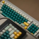 Vibrant Rainforest PBT Dye-Sub Keycap Set, showcasing lush greens, earthy browns, and tranquil cream in an artistic rainforest ecosystem.