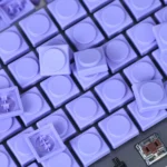 Multiple angle views of unique Pig Nose low-Shaft Choc V1 keycaps. Showcasing their sleek, modern design, ergonomic contour, and premium PBT/PC material.