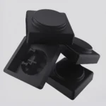 Shaft A set of 10 sleek, black 1U Pig Nose low-Shaft Choc keycaps, 16.5mm, showcasing their unique ergonomic design for a premium typing experience.