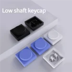 Sleek, modern 'Pig Nose' low-shaft Choc keycaps crafted from premium PBT/PC, highlighting their unique ergonomic contour for superior typing comfort.