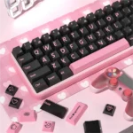 A close-up view of the Pink Lightning PBT keycaps set, showcasing vibrant black and pink electric lightning motifs and durable PBT material for a planing.