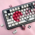 Detailed gallery of elegant PBT side-lit plum blossom keycaps set, showcasing serene Chinese art and delicate, nature-inspired design from various angles.