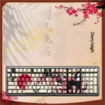 Close-up of elegant plum blossom PBT side-lit keycaps set, showcasing serene Chinese art and delicate, nature-inspired designs.