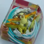Exclusive Pokemon artisan keycap featuring Pidgeot, showcasing vibrant details from a unique angle, highlighting its premium craftsmanship.
