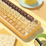 A gallery of playful MDA profile PBT pudding cat keycaps set, highlighting their soft, milky translucency and vibrant RGB glow from various perspectives.