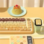 Playful PBT Pudding Cat Keycaps Set for RGB, shown in a gallery of angles, highlighting their soft milky translucent MDA profile and vibrant RGB optimization.