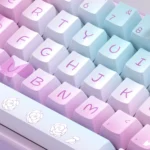 Ethereal Purple Butterfly PBT Dye-sub Keycap Set. Artistic views show delicate purple butterflies dancing on keys, inspired by dreamy fantasy gardens.