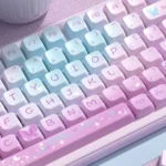 Vibrant, ethereal purple butterfly MDA PBT keycaps set. Dye-sublimated designs showcase their fantasy-inspired motifs and serene elegance across various angles.