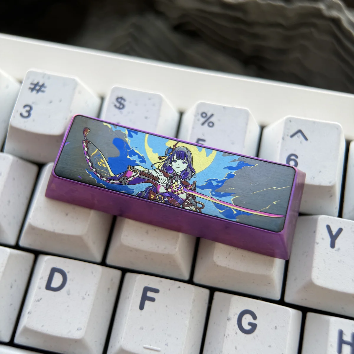 Regal titanium Raiden Shogun keycap for Genshin Impact, shown from various angles, highlighting its premium Electro Archon design and durable anodize design.